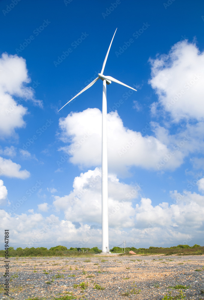 Wind turbine electricity on blue sky background
