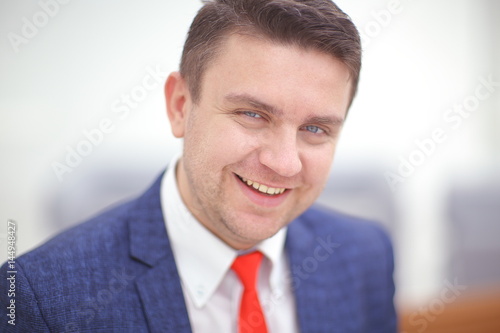 Close up portrait of an attractive businessman smiling