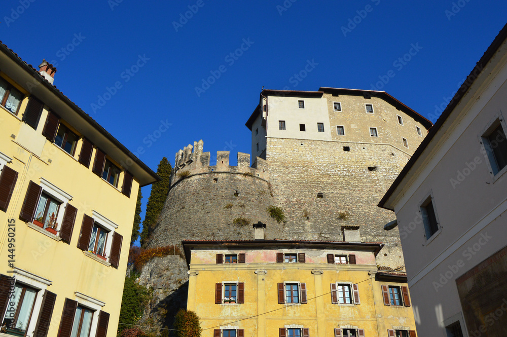 View of Medieval Rovereto Castle and houses in Rovereto town in the winter, Trento, Italy 
