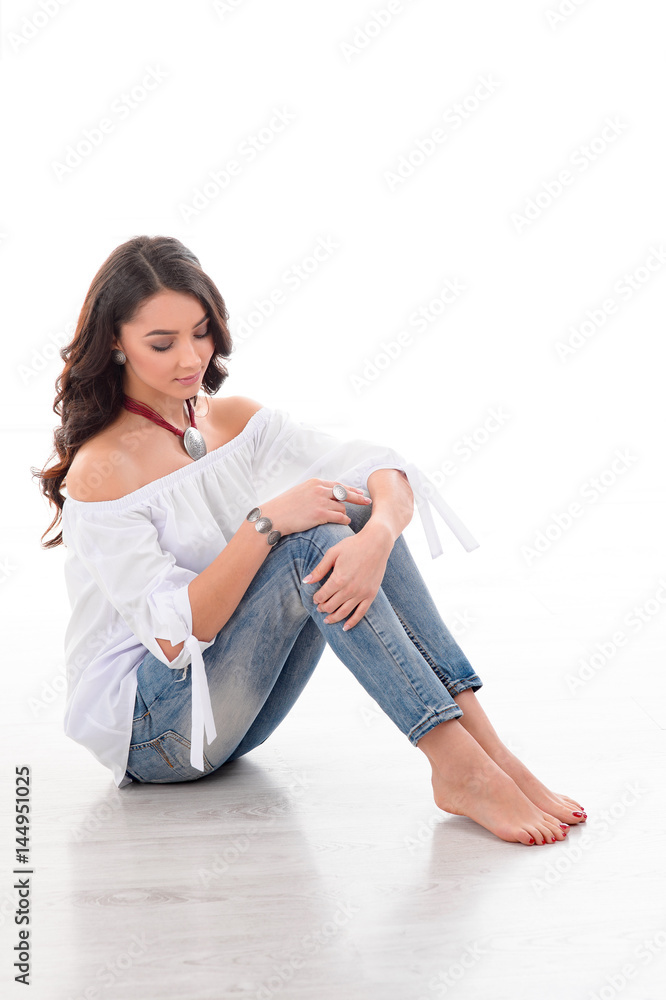 Stylish jewelry collection on brunet long hair model Stylish jewelry collection on brunet long hair model