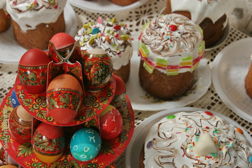 Still life with Nice colorful Easter eggs and traditional Easter cakes