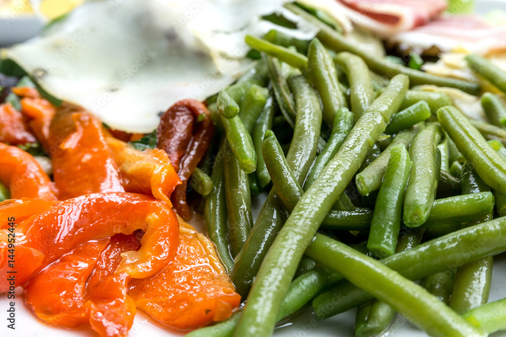 Fresh salad - Delicious fresh salad with tomatoes, lettuce, eggplant, zucchini, cheese, parma ham and olive oil.