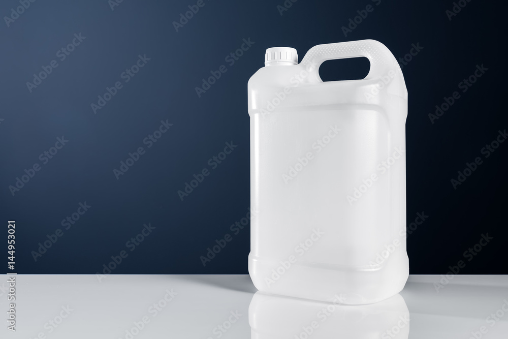Unlabeled white plastic tank canister chemical liquid container Stock Photo