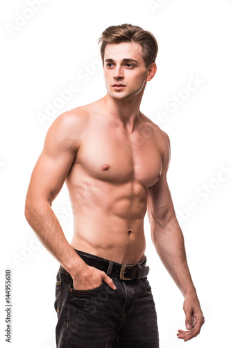 Well built shirtless muscular male model against white background