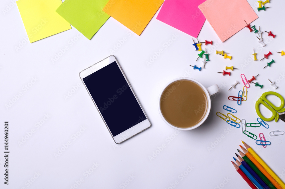 White background, smartphone and cup of hot coffee. White background, smartphone and cup of hot coffee.