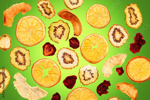 Dried Fruits on green background
