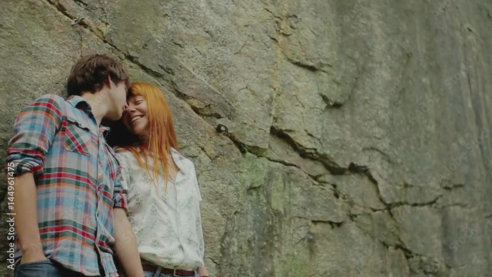 Happy couple has a good time at camping trip.