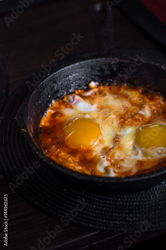 Fried eggs in tomato sauce (shakshuka)
