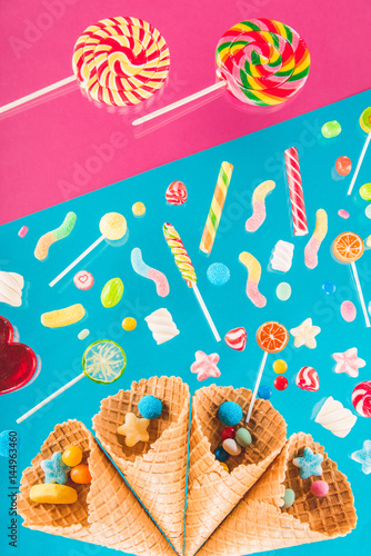 Close-up view of crispy waffle cones with different gourmet candies