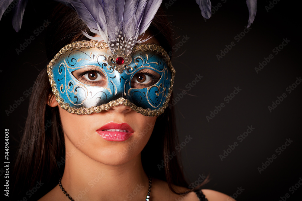 Beautiful young woman with mask .