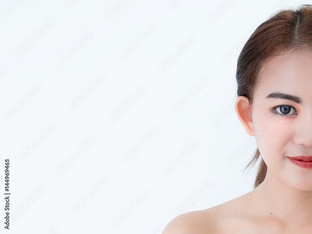 Closeup portrait of asian woman half face skincare on white background Closeup portrait of asian woman half face skincare on white background