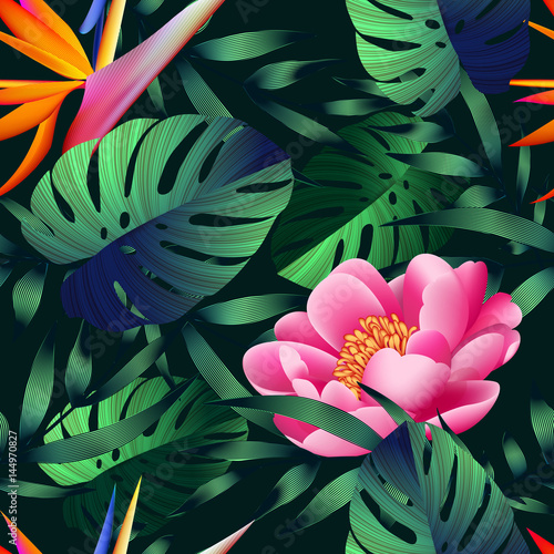 Tropical flowers, jungle leaves, bird of paradise flower.
