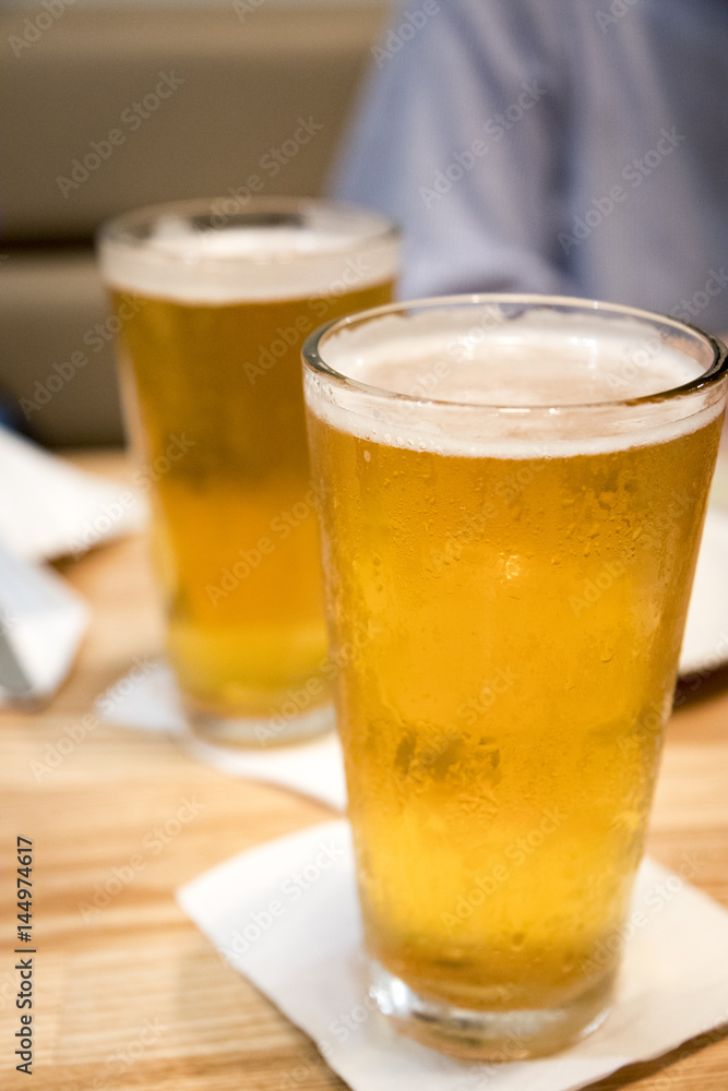 frozen glasses of beer on the table frozen glasses of beer on the table