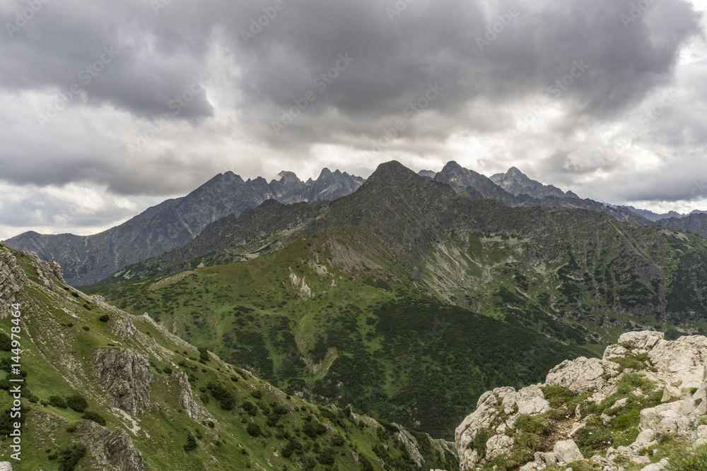 Panorama of the great peaks under the clouds. Tatra Mountains. Slovakia