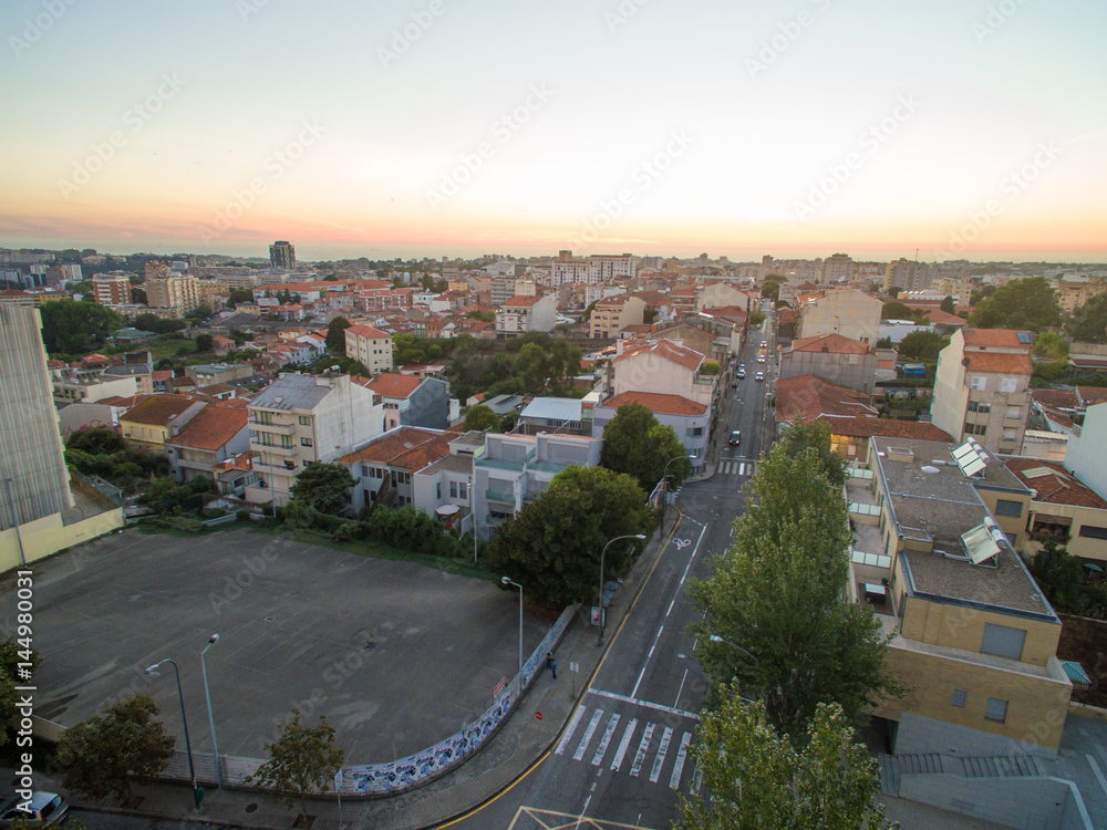 View of the sunset from the side of the new Porto, Portugal. Aerial