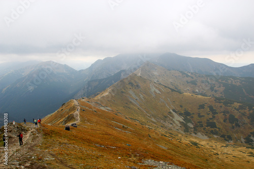 Hiker people walking in mountains