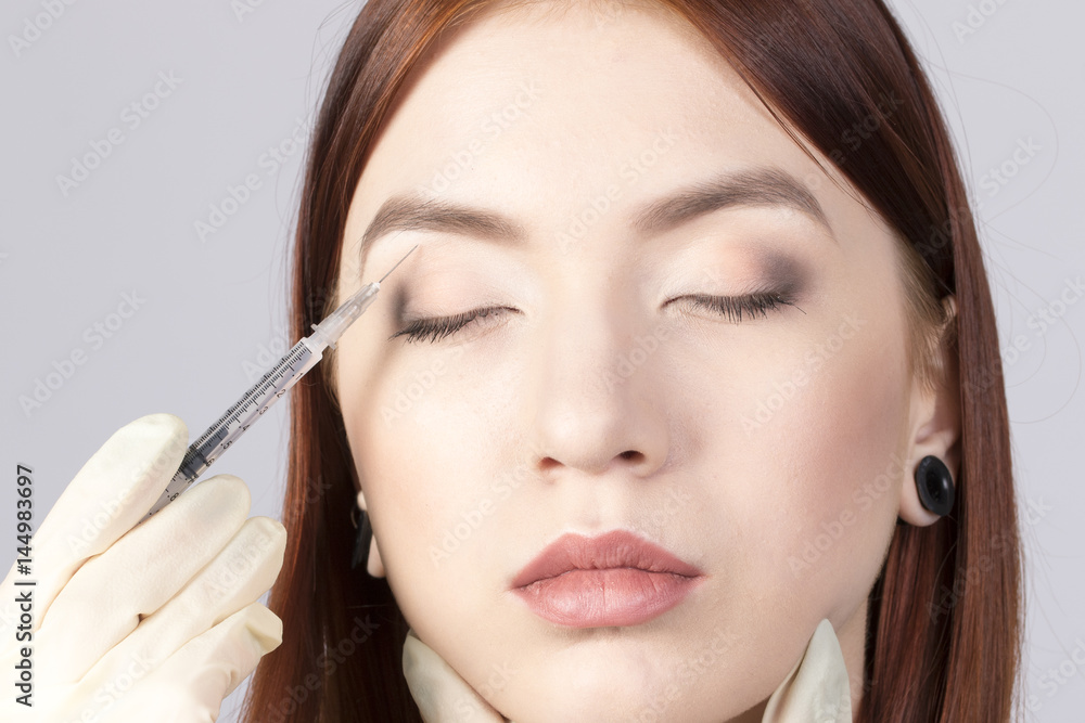 Beauty woman make injections in skin face