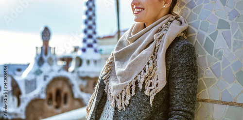 Photography stylish woman standing in Barcelona, Spain in winter