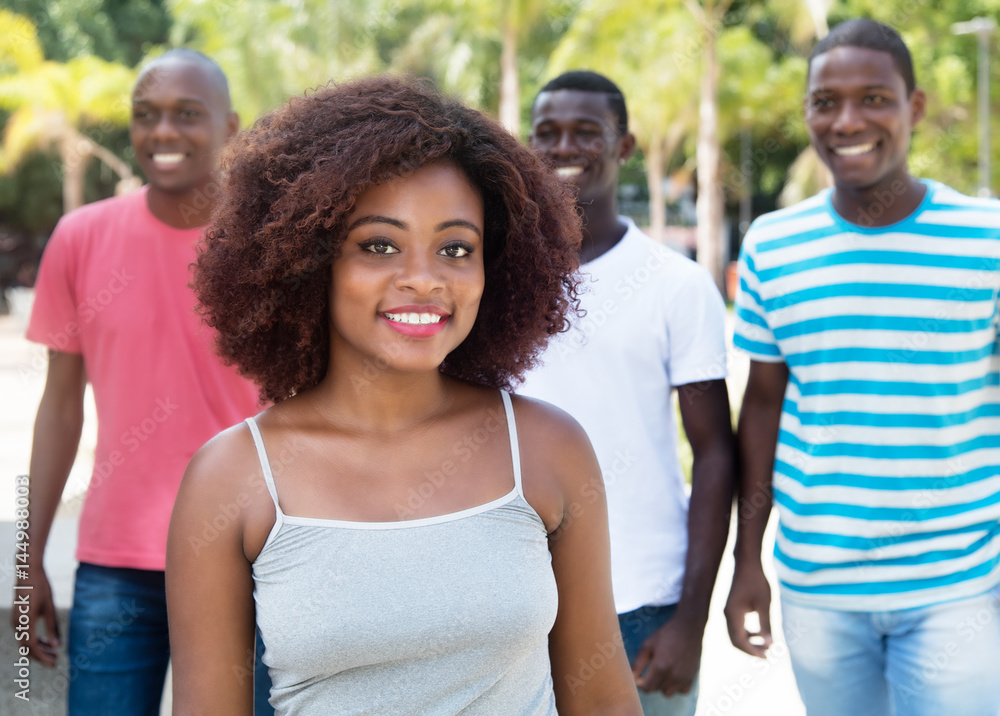 Laughing african american woman with friends from Africa Laughing african american woman with friends from Africa