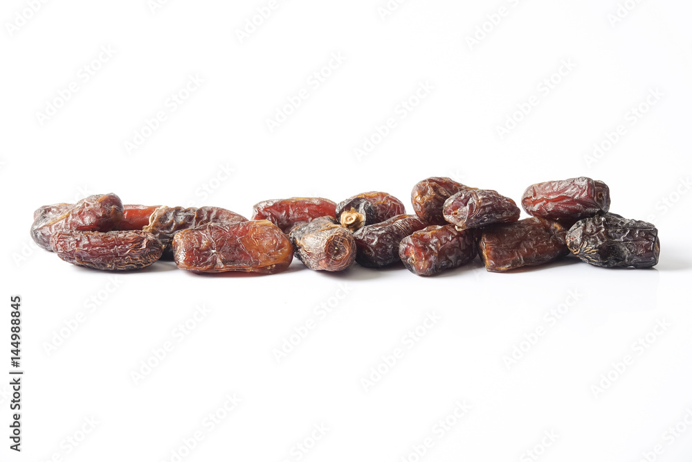 Date fruits on white background. Selective focus. Date fruits on white background. Selective focus.