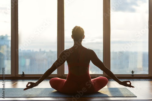 Calm woman relaxing during meditation