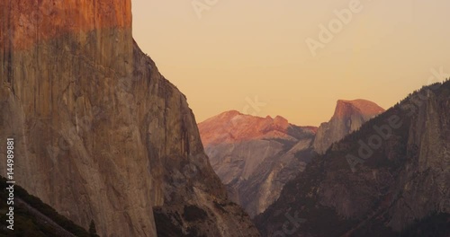 Yosemite Valley can be seen from tunnel viewpoint during sunset at the Yosemite National Park, California. photo