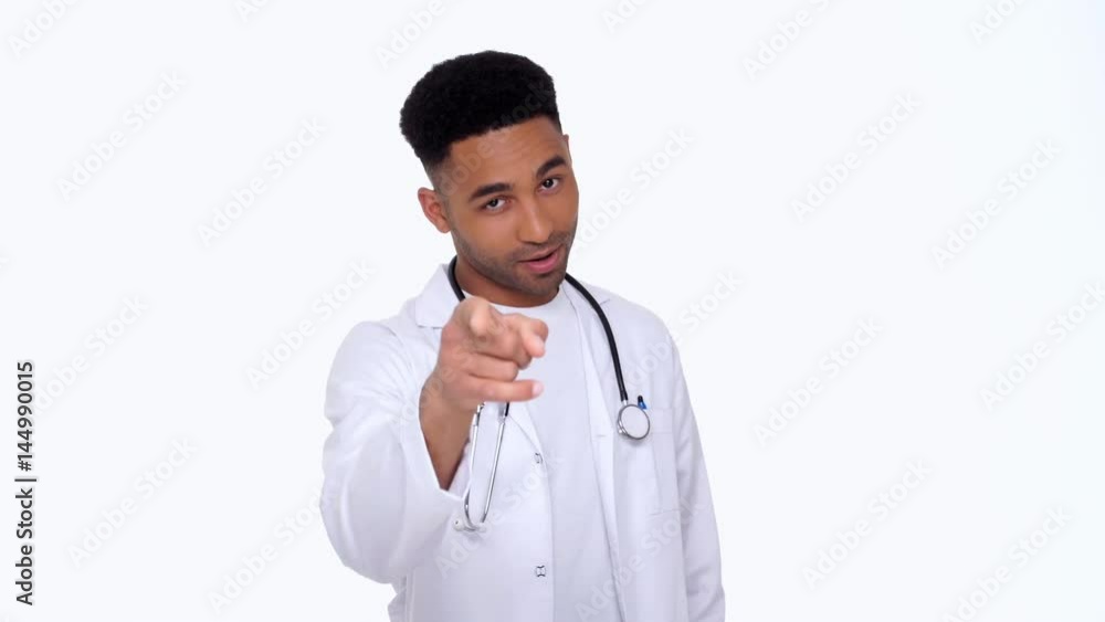 Young african doctor wearing lab coat showing at camera isolated Young african doctor wearing lab coat showing at camera isolated