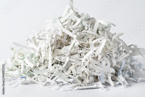 Pile of shredded paper on white background 