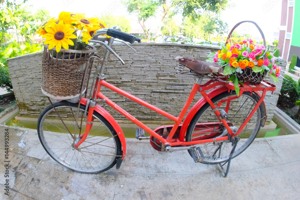 Decorative the bicycle with artificial flowers