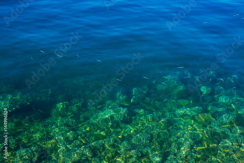 Texture of water. Transparent azure sea water of the Adriatic Sea.