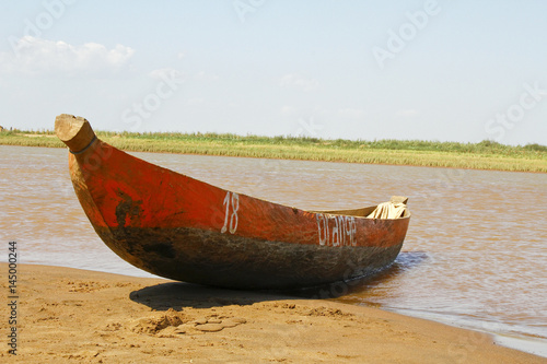 Traditional malagasy boat- canoe, africa, madagascar photo