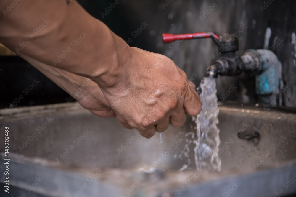 Close up of Washing hands with dirt faucet and washbasin. Copy space. Close up of Washing hands with dirt faucet and washbasin. Copy space.
