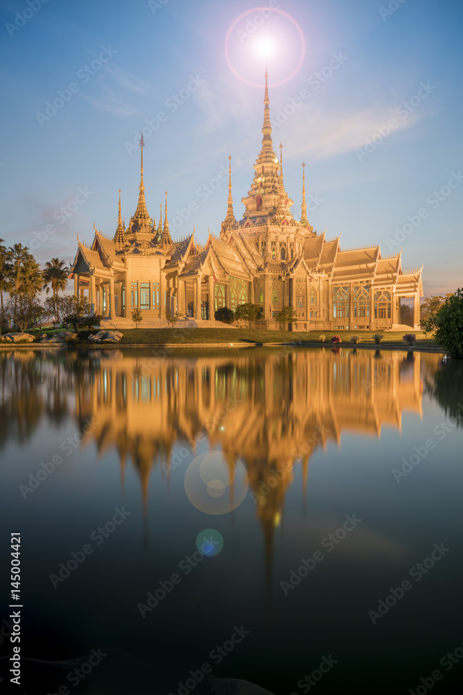 19April2017,Thailand temple Wat bungkum on sunset with lens flare and top of temple:Nakorn ratchasima,Thailand