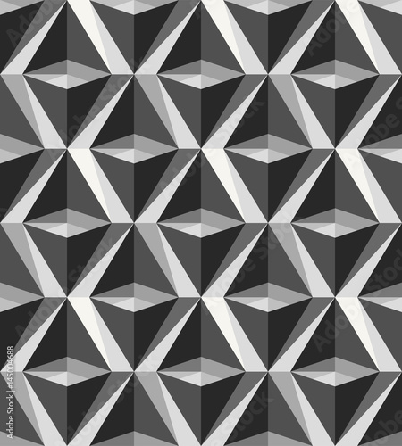 Modern stylish monochrome geometric texture with structure of repeating rhombuses and triangles. Polygonal background with volumetric effect perfect for wallpapers and decor. Vector seamless pattern.