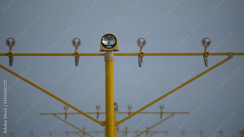 Runway lights. Landing of a large aircraft at the airport Runway lights. Landing of a large aircraft at the airport