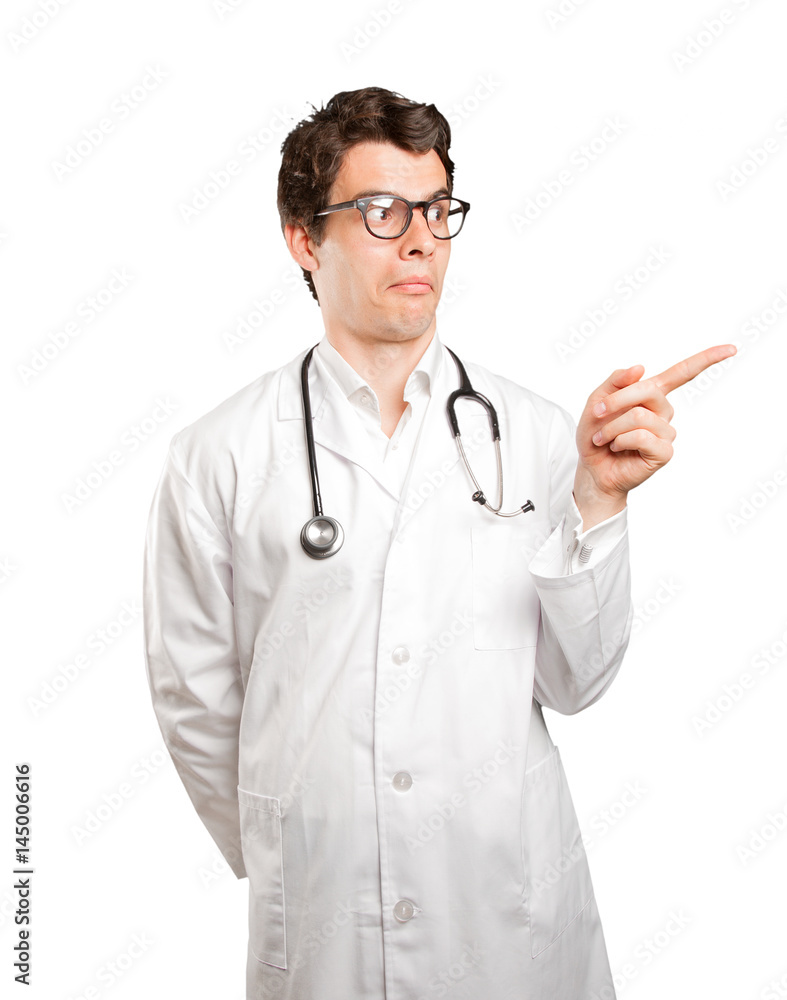 Surprised doctor pointing against white background