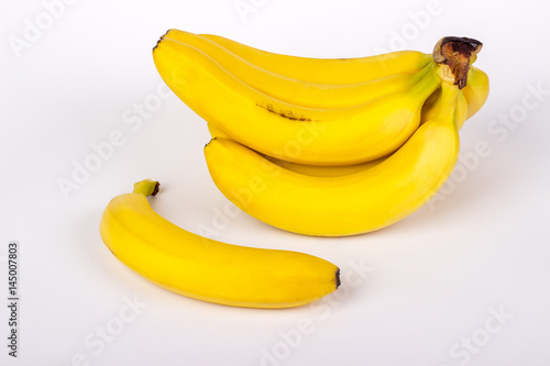 Natural juicy bananas on the white background