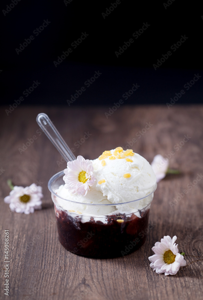 Coconut ice cream with sticky ricein and flower in bowl, Dessert and sweets, selective focus