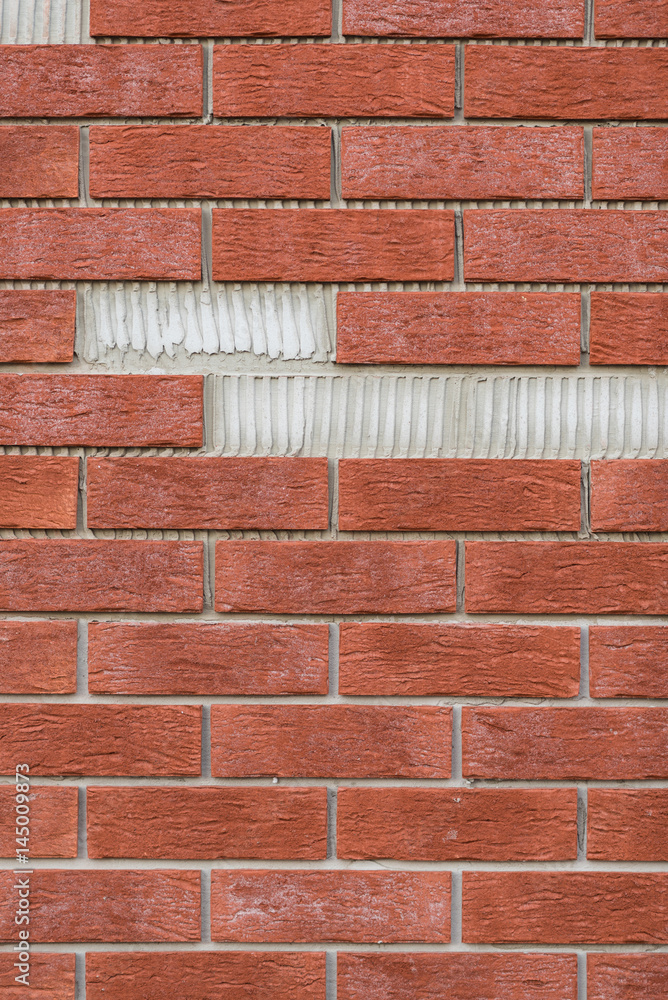 Obraz premium Brick wall with missing parts.