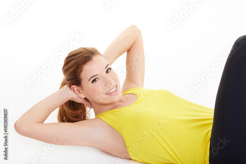 one woman exercising workout fitness aerobic exercise abdominals push ups posture on studio isolated white background