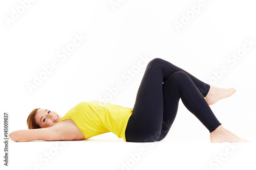 one woman exercising workout fitness aerobic exercise abdominals push ups posture on studio isolated white background