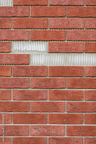 Brick wall with missing parts.