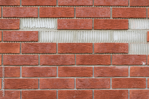 Brick wall with missing parts.