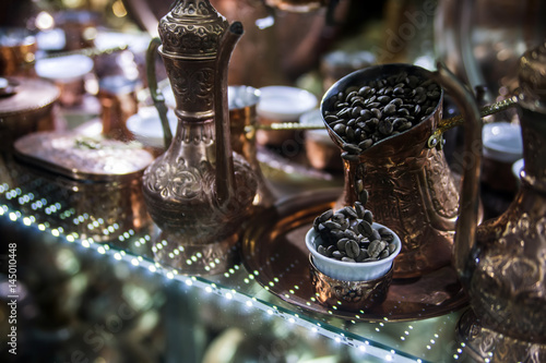 Fototapeta Naklejka Na Ścianę i Meble -  Traditional handcrafted copper coffee pots in souvenir shop in Sarajevo