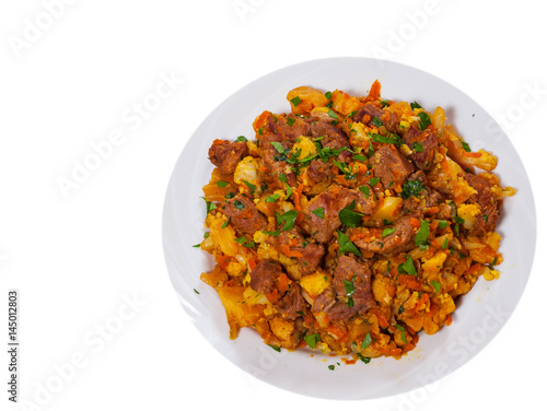 stew vegetables with meat. top view. isolated on white