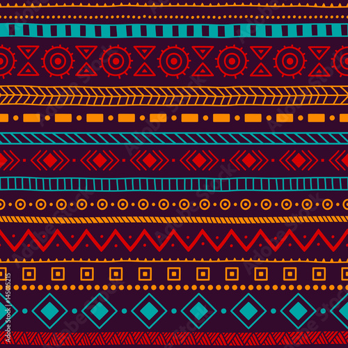 Seamless ethnic ornament. Aztec and tribal motifs. Ornament drawn by hand. Blue, yellow, red and purple colors. Horizontal lines. Print for your textiles.