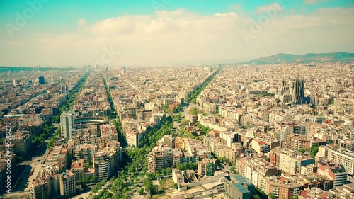 Barcelona city aerial view on a sunny day, Spain. Famous Sagrada Familia - Basilica and Expiatory Church of the Holy Family