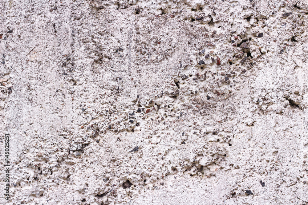 Naklejka premium Uneven stucco texture as background