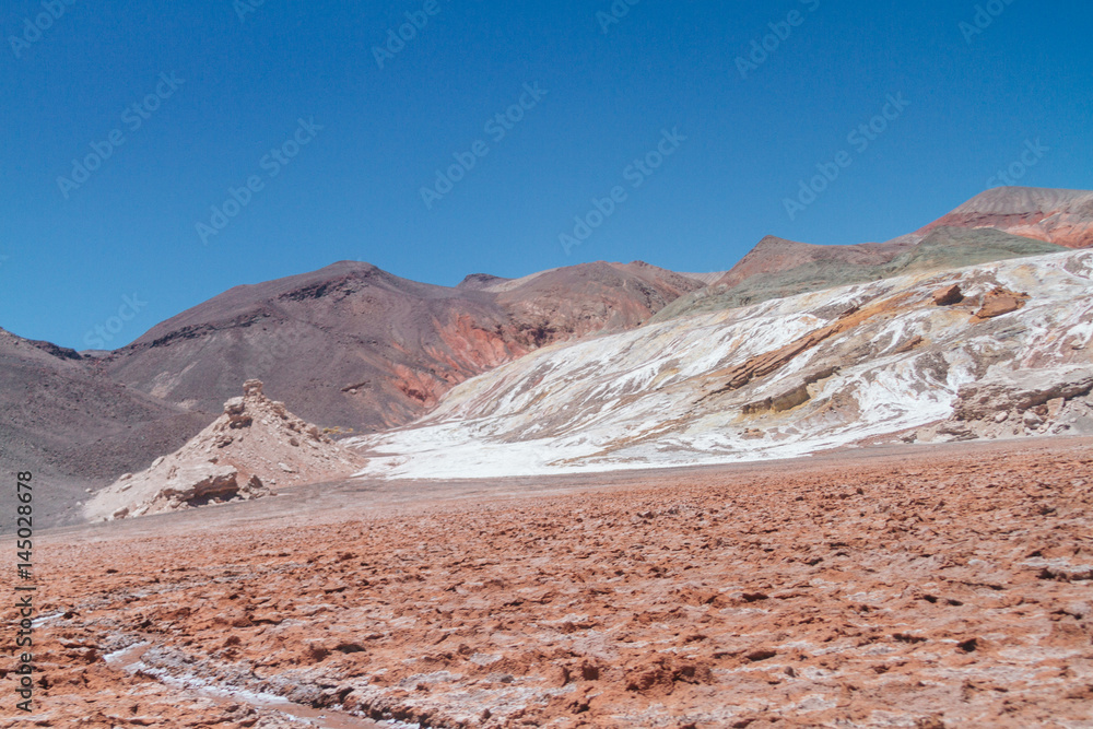 Red hills with steppe rocks and saltpeter in Catamarca, Argentina