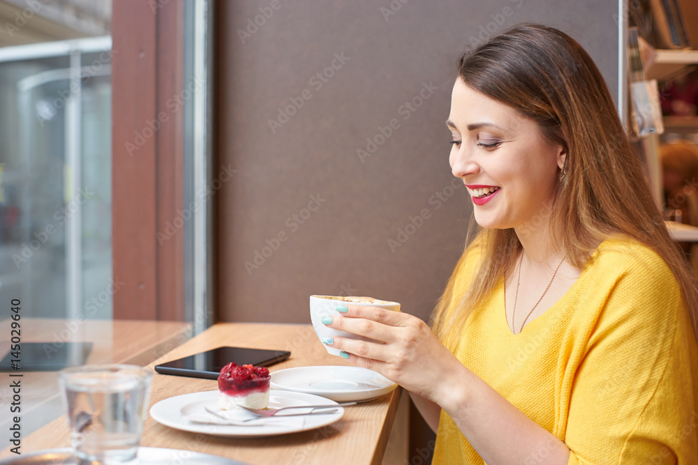 Woman drinks coffee- Woman drinks coffee-